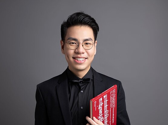 Absolvent Fangqixiong Yuan