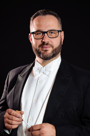 Mag. Laszlo Gyüker